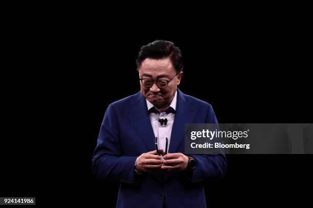 Koh, president of mobile communications at Samsung Electronics Co., presents the Galaxy S9 and S9+ smartphones during a Samsung Electronics Co....