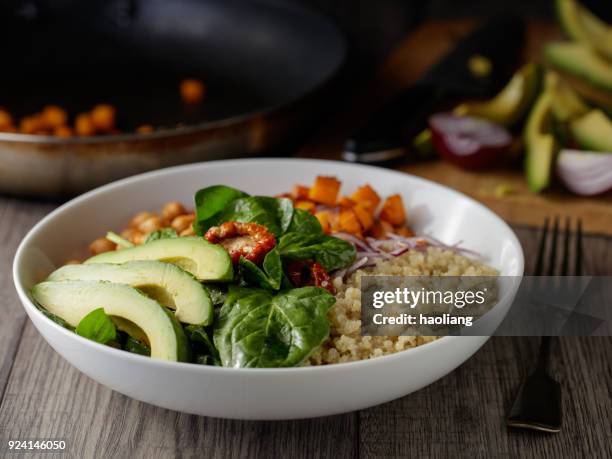 healthy quinoa vegan bowl - quinoa and chickpeas stock pictures, royalty-free photos & images