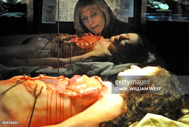 Tina Minichilli inspects a display at a Leonardo Da Vinci exhibition titled 'Anatomy to Robots', in Melbourne on October 28, 2009 a world premiere...