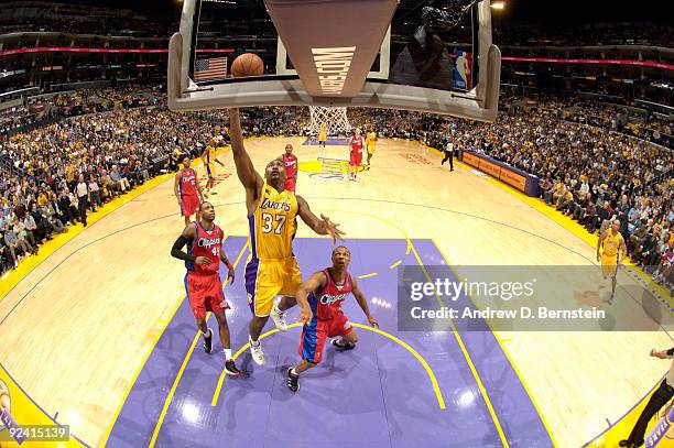 Ron Artest of the Los Angeles Lakers goes up for a shot against the Los Angeles Clippers in the season opener at Staples Center on October 27, 2009...