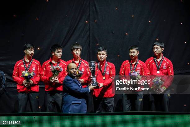 Zhendong, LIN Gaoyuan, XU Xin, MA Long, YU Ziyang and the coach LU Guozheng the Chinese winning, gold medal men team during the decoration ceremony...