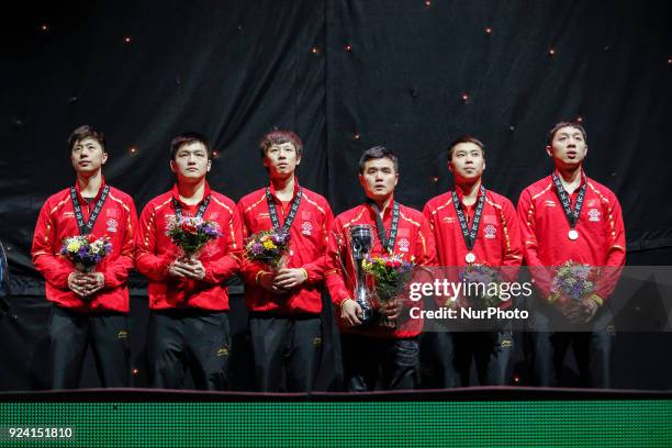 Zhendong, LIN Gaoyuan, XU Xin, MA Long, YU Ziyang and the coach LU Guozheng the Chinese winning, gold medal men team during the decoration ceremony...
