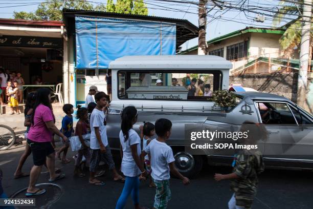 Funeral scene seen in navotas cemetery slum. In the center of Pasay District of Metro Manila is a cemetery where over 10,000 deceased people is...