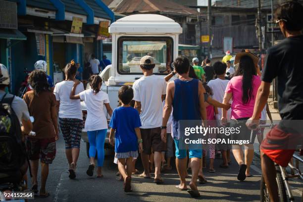 Funeral Scene seen in the navotas cemetery slum.In the center of Pasay District of Metro Manila is a cemetery where over 10,000 deceased people is...