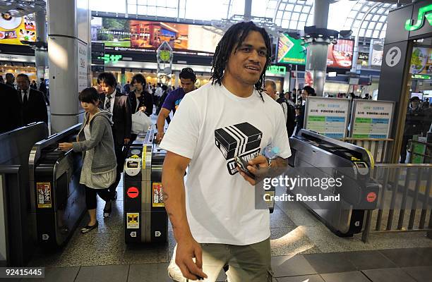 Rodney So'oialo walks to catch the tube on a scenic tour around Tokyo following a New Zealand All Blacks training session at Kubota Spears Rugby...