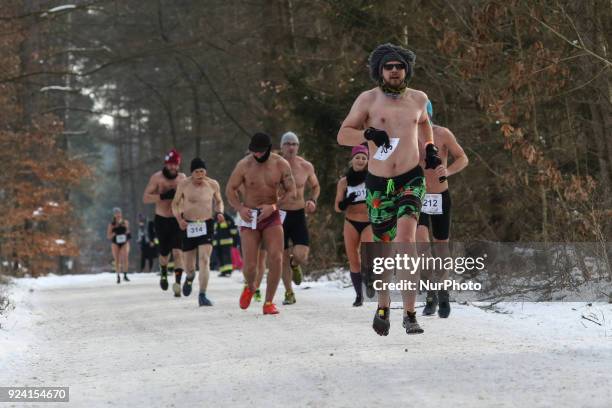 Runners wearing only running shoes, hats and swimsuits are seen in Garczyn, northern Poland on 25 February 2018 Over 200 runners competite on 4 km...