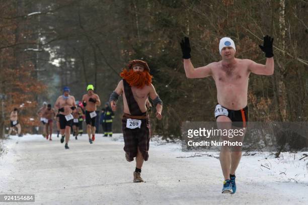 Runners wearing only running shoes, hats and swimsuits are seen in Garczyn, northern Poland on 25 February 2018 Over 200 runners competite on 4 km...