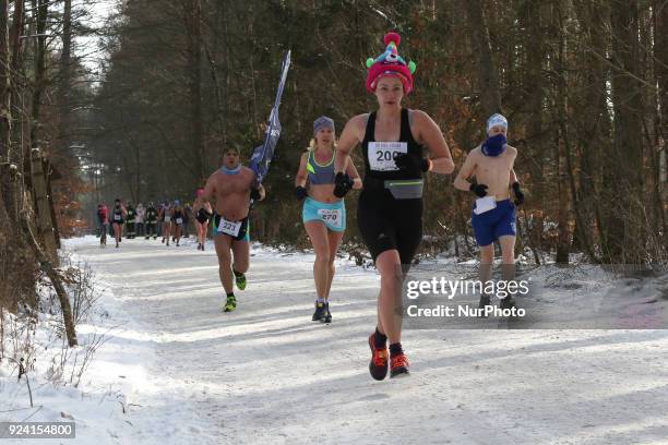 Runners wearing only running shoes, hat and swimsuit are seen in Garczyn, northern Poland on 25 February 2018 Over 200 runners competite on 4 km...