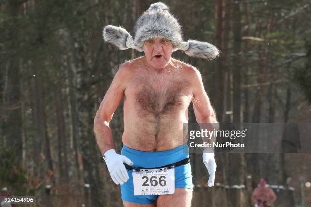 Runner wearing only running shoes, hat and trunks is seen in Garczyn, northern Poland on 25 February 2018 Over 200 runners competite on 4 km...