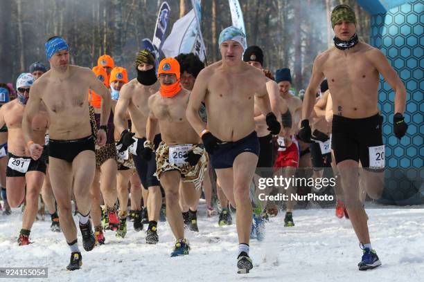 Runners wearing only running shoes, hat and swimsuit are seen in Garczyn, northern Poland on 25 February 2018 Over 200 runners competite on 4 km...