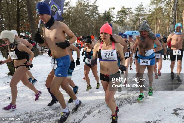 Runners wearing only running shoes, hat and swimsuit are seen in Garczyn, northern Poland on 25 February 2018 Over 200 runners competite on 4 km...