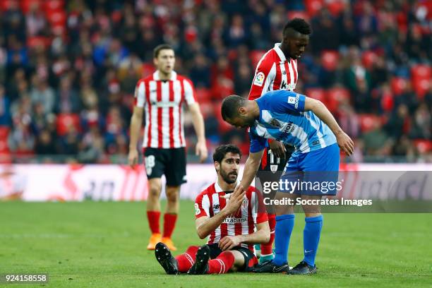 Raul Garcia of Athletic Bilbao, Medhi Lacen of Malaga CF, during the La Liga Santander match between Athletic de Bilbao v Malaga at the Estadio San...