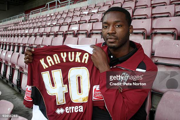Patrick Kanyuka of Northampton Town holds his shirt Prior to the Totesport.Com Combination League Match between Northampton Town Res and Wycombe...