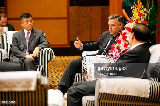 Commerce Secretary Gary Locke , U.S. Ambassador Jon Huntsman and Zhejiang Provincial Governor Lu Zushan talk during a meeting on October 28, 2009 in...