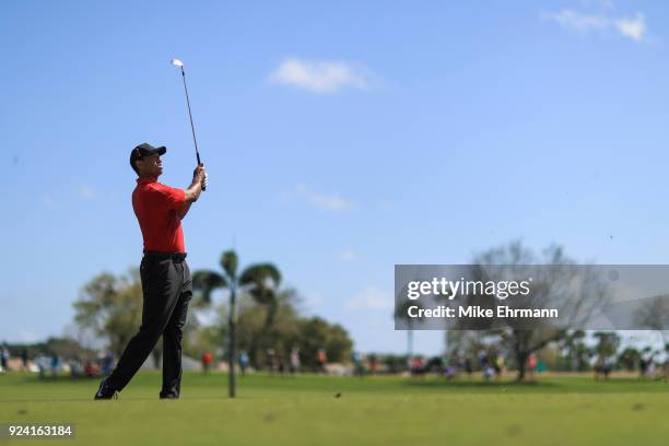 Tiger Woods plays a shot on the first hole during the final round of the Honda Classic at PGA National Resort and Spa on February 25, 2018 in Palm...
