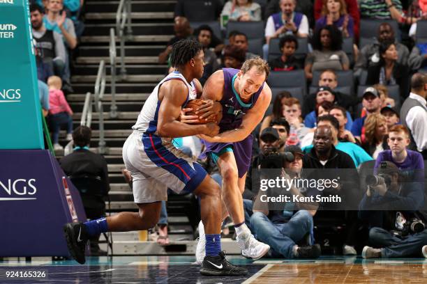 Stanley Johnson of the Detroit Pistons and Cody Zeller of the Charlotte Hornets battle for the ball during the game on February 25, 2017 at Spectrum...