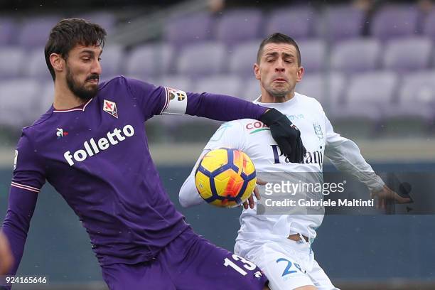 Davide Astori of ACF Fiorentina in action aginst Manuel Pucciarelli of AC Chievo Verona during the serie A match between ACF Fiorentina and AC Chievo...