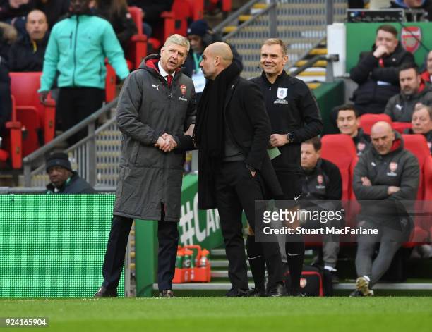 Arsenal manager Arsene Wenger shakes hands with Man City manager Pep Guardiola during the Carabao Cup Final between Arsenal and Manchester City at...
