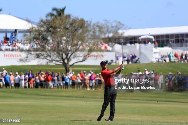 Tiger Woods plays a shot on the first hole during the final round of the Honda Classic at PGA National Resort and Spa on February 25, 2018 in Palm...