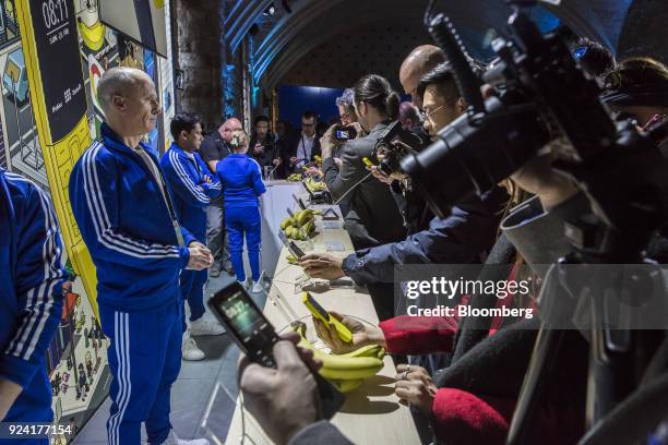 Attendees photograph Nokia 8110 4G smartphones, manufactured by HMD Global Oy, during a launch event ahead of the Mobile World Congress in Barcelona,...