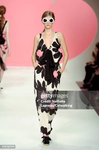 Model walks down the runway during the Moschino Cheap & Chic Fashion Show as part of the Milan Womenswear Fashion Week Spring/Summer 2010 at the...