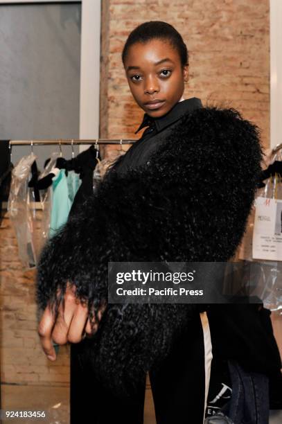 Model is seen backstage ahead of the Brognano show during Milan Fashion Week Autumn/Winter 2019.