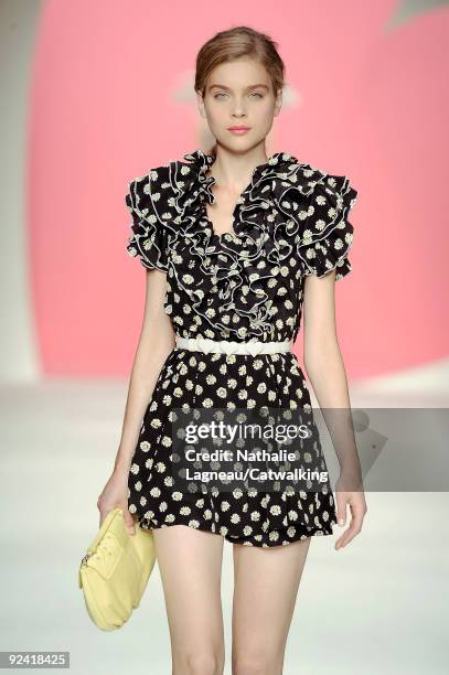 Model walks down the runway during the Moschino Cheap & Chic Fashion Show as part of the Milan Womenswear Fashion Week Spring/Summer 2010 at the...