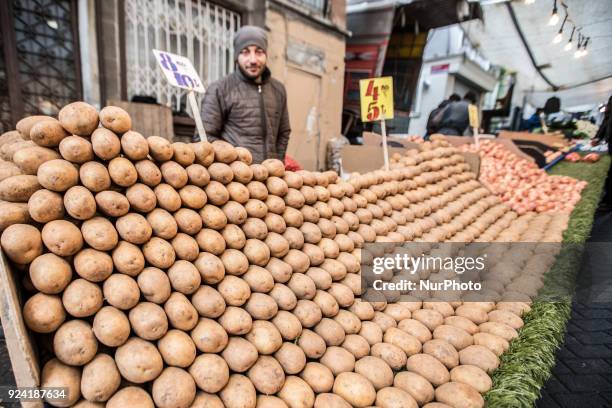 Man selling potatos in Tarlabasi Sunday market in Istanbul, 25 February 2018 Every Turkish city has its own bazaar that sells local goods from the...
