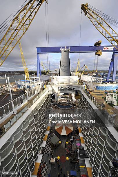 The world's biggest and most expensive cruise ship, Oasis of the Seas, is docked at the STX Finnish shipyard in Turku on October 28, 2009. The ship...