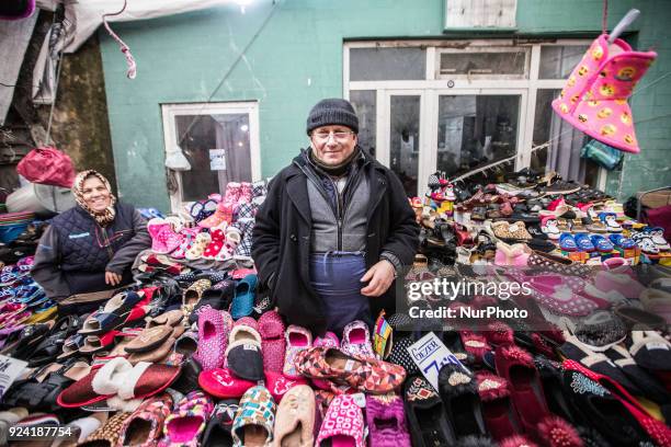 Man selling shoes in Tarlabasi Sunday market in Istanbul, 25 February 2018 Every Turkish city has its own bazaar that sells local goods from the...