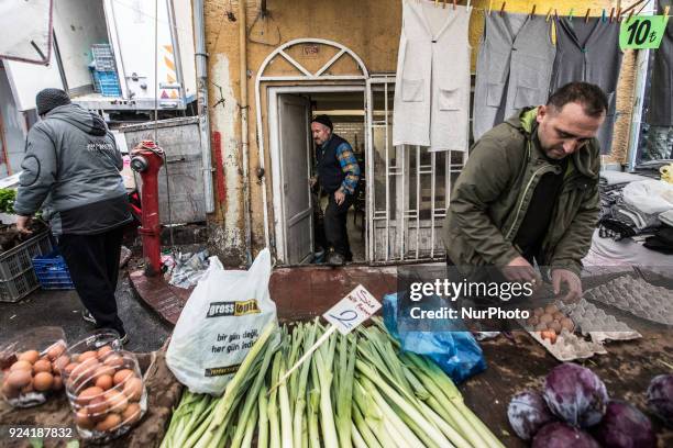 Man selling greens in Tarlabasi Sunday market in Istanbul, 25 February 2018 Every Turkish city has its own bazaar that sells local goods from the...