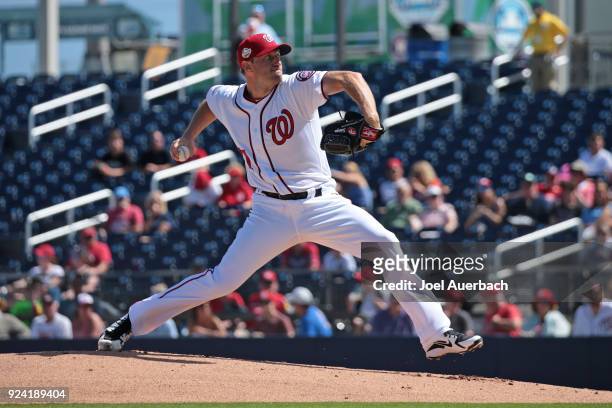 Max Scherzer of the Washington Nationals throws the ball against the Atlanta Braves during the first inning of a spring training game at The Ballpark...