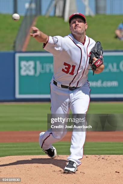 Max Scherzer of the Washington Nationals throws the ball prior to the start of the spring training game against the Atlanta Braves at The Ballpark of...