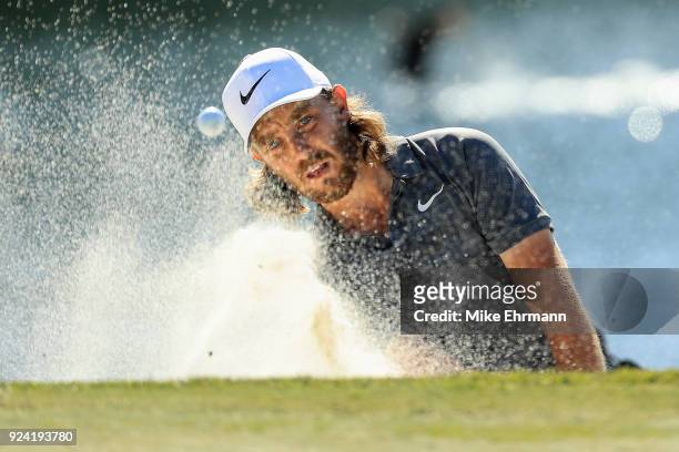 Tommy Fleetwood of England plays a shot on the sixth hole during the final round of the Honda Classic at PGA National Resort and Spa on February 25,...