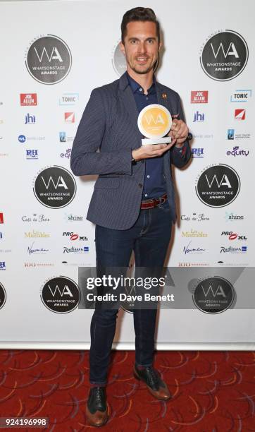 Simon Adkins, accepting the Best Choreography award on behalf of Randy Skinner for "42nd Street", poses in the press room at the 18th Annual...