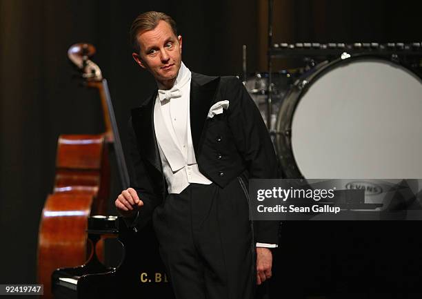 German singer Max Raabe poses at a photocall for the release of his new DVD "Heute Nacht Oder Nie" at Admiralspalast theatre on October 28, 2009 in...