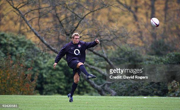 Jonny Wilkinson kicks the ball upfield during the England training session held at Pennyhill Park on October 28, 2009 in Bagshot, England.