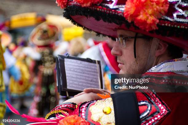 Mummers prepare to strut down Main Street in the Manayunk neighborhood of Philadelphia, PA, during the annual Mardi Grass parade, on February 25,...