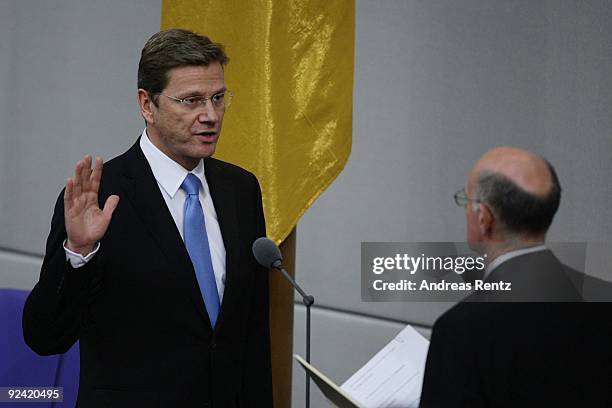 Newly appointed German Vice Chancellor and Foreign Minister Guido Westerwelle takes the oath of office as Norbert Lammert , President of the German...