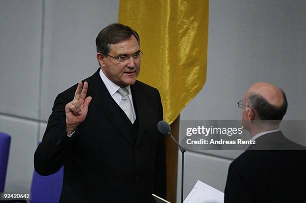 Newly appointed German Minister of Work and Social Issues Franz Josef Jung takes the oath of office as Norbert Lammert , President of the German...