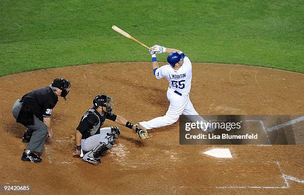 Russell Martin of the Los Angeles Dodgers at bat against the Colorado Rockies at Dodger Stadium on October 2, 2009 in Los Angeles, California.