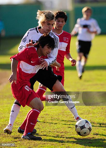 Luca Durholdz of Germany fight for the ball with and Mazlum Aslan during the U17 Euro qualifying match between Germany and Turkey on October 28, 2009...