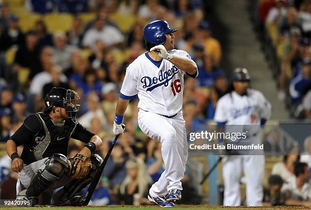 Andre Ethier of the Los Angeles Dodgers hits a double in the first inning against the Colorado Rockies at Dodger Stadium on October 2, 2009 in Los...