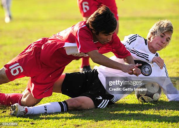 Luca Durholdz of Germany and Mazlum Aslan of Turkey fight for the ball during the U17 Euro qualifying match between Germany and Turkey on October 28,...