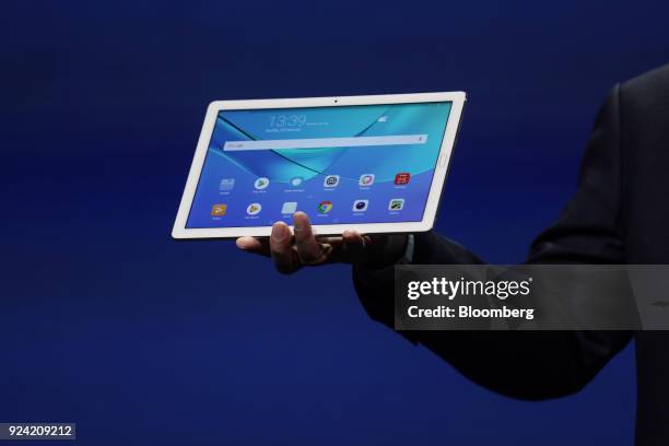 Richard Yu, chief executive officer of Huawei Technologies Co., presents the MediaPad M5 tablet device during the company's launch event ahead of the...