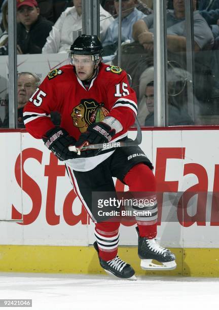 Andrew Ebbett of the Chicago Blackhawks turns towards the puck during a game against the Nashville Predators on October 24, 2009 at the United Center...