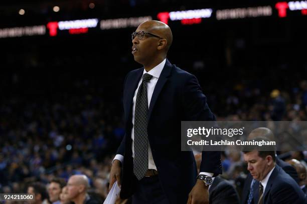 Los Angeles Clippers assistant coach Sam Cassell looks on from the bench during the game against the Golden State Warriors at ORACLE Arena on...