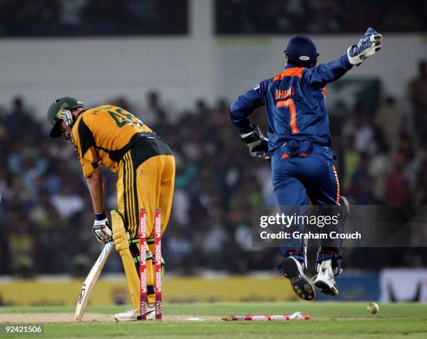 Mike Hussey of Australia is bowled during the Second One Day International match between India and Australia at the Vidarbha Cricket Association...