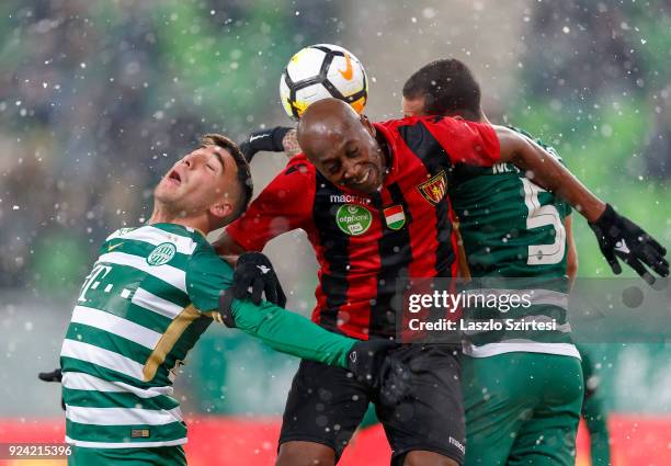 Fernando Gorriaran of Ferencvarosi TC and Marcos Pedroso of Ferencvarosi TC battles for the ball in the air with Danilo Cirino de Oliveira 'Danilo'...