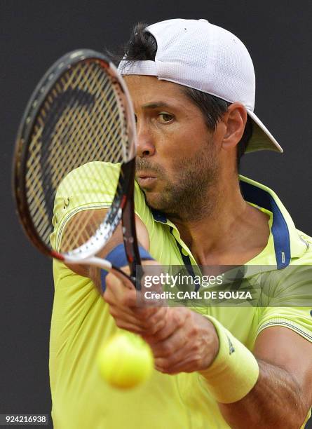 Spain's Fernando Verdasco returns the ball to Argentina's Diego Schwartzman during their ATP World Tour Rio Open singles final tennis match at the...